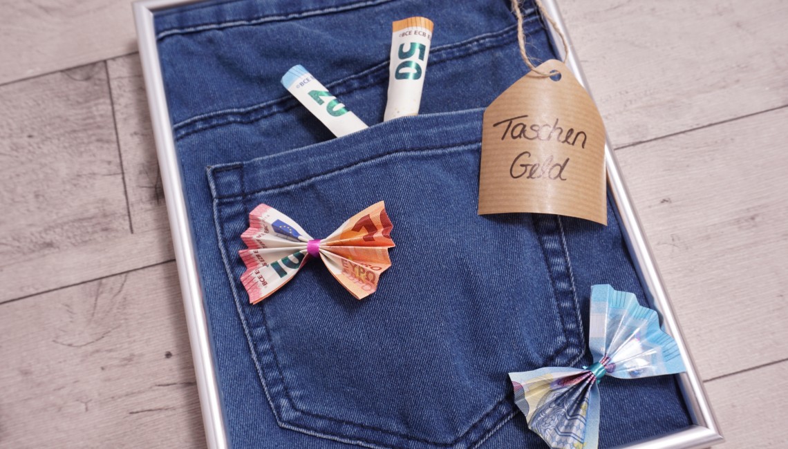 Jeans Taschengeld im Bilderrahmen